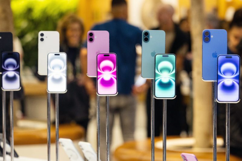 When Tim Cook gifted President Donald Trump a gold and glass plaque last month, the Apple CEO was hailed by Wall Street for his job managing the iPhone-maker’s relationship with the White House. 
Cook, Wall Street commentators said, had largely navigated the threat of tariffs on Apple’s business successfully by offering Trump an additional $100 billion U.S. investment, a win the president could tout on American manufacturing. But despite the 24-carat trophy Cook handed Trump, the true costs of those tariffs may finally show up for Apple customers later this month. 
“Thank you all, and thank you President Trump for putting American innovation and American jobs front and center,” Cook said at the event, which brought Apple’s total planned spend to $600 billion in the U.S. over the next five years. Trump, at the event, said that Apple would be exempt from forthcoming tariffs on chips that could double their price.
But as Apple prepares to announce new iPhones on Tuesday, some analysts are forecasting the company to raise prices on its devices even after all Cook has done to avoid the worst of the tariffs.
“A lot of the chatter is: Will the iPhone go up in price?” said CounterPoint research director Jeff Fieldhack.
Although smartphones haven’t seen significant price increases yet, other consumer products are seeing price increases driven by tariffs costs, including apparel, footwear, and coffee. And the tariffs have hit some electronics, notably video games — Sony, Microsoft and Nintendo, have raised console prices this year in the U.S.
Some Wall Street analysts are counting on Apple to follow. Jeffries analyst Edison Lee baked in a $50 price increase into his iPhone 17 average selling price projections in a note in July. He’s got a hold rating on Apple stock.
Goldman Sachs analysts say that the potential for price increases could increase the average selling price of Apple’s devices over time, and the company’s mix of phones have been skewing toward more expensive prices. 
Analysts expect Apple to release four new iPhone models this month, which will likely be named the “iPhone 17” series. Last year, Apple released four iPhone 16 models: the base iPhone 16 for $829, the iPhone 16 Plus at $899, the iPhone 16 Pro at $999 and the iPhone 16 Pro Max at $1,199.
This year, many supply chain watchers expect Apple to replace the Plus model, which has lagged the rest of the lineup, with a new, slimmer device that trades extra cameras and features for a thinner, lighter body.
The “thinner, lighter form factor may drive some demand interest,” wrote Goldman analysts, but tradeoffs like battery life may make it hard to compete with Apple’s entry-level models.
Analysts have said they expect the slim device to cost about $899, similar to how much the iPhone 16 Plus costs, but they haven’t ruled out a price bump. That would still undercut Samsung’s thin Galaxy Edge, which debuted earlier this year at $1,099.
Apple did not respond to a request for comment.
When Trump announced sweeping tariffs on China and the rest of the world in February, it seemed like Apple was in the crosshairs.
Apple famously makes the majority of its iPhones and other products in China, and Trump was threatening to place tariffs that could double Apple’s costs or more. Some of Trump’s so-called “reciprocal” tariffs would hit countries like Vietnam and India where Apple had hedged its production bets.
But seven months later, Apple has weathered the tariffs better than many had imagined.
The U.S. government has paused the most draconian Chinese tariffs several times, smartphones got an exemption from tariffs and Cook in<strong> </strong>May told investors that the company was able to rearrange its supply chain to import iPhones to the U.S. from India, where tariffs are lower.
Cook also successfully leaned on his relationship with Trump, visiting him in White House and taking his side in August, when Cook presented the shiny keepsake to Trump. That commitment bolstered Trump’s push to bring more high-tech manufacturing to the U.S. In exchange, Trump said he would exempt Apple from a forthcoming semiconductor tariff, too. And Trump’s IEEPA tariffs were ruled illegal in late August, although they are still in effect.
Apple hasn’t completely missed the tariff consequences. Cook said the company spent $800 million on tariff costs in the June quarter, mainly due to the IEEPA-based tariffs on China. That was less than 4% of the company’s profit, but Apple warned it could spend $1.1 billion in the current quarter on tariff expenses.
After months<strong> </strong>of eating the tariff costs itself, Apple may finally pass those costs to consumers with this month’s launch of the iPhone 17 models. 
Apple has been judicious about hardware price increases in the U.S. The smaller Pro phone, for example, hasn’t gotten a price increase since its debut in 2017, holding at $999. But Apple has made some price changes.
The company raised the price of its entry level phones from $699 to $829 in 2020. And in 2022 when Apple eliminated the smaller iPhone Mini that started at $699, the company replaced it with the bigger-screen Plus that costs $899. The Pro Max also got a hike in 2023 when Apple bumped it from $1,099 to its current price of $1,199.
If Apple does increase prices on its phones this year, don’t expect management to blame tariffs. 
The average selling price of smartphones around the world is rising, according to IDC. The price of smartphone components, such as the camera module and chips, have been increasing in recent years.
Apple is much more likely to focus on highlighting its phones’ new features and quietly note the new price. Analysts expect the new iPhones to have larger screens, increased memory and new, faster chips for AI.
“No one’s going to come out and say it’s related to tariffs,” said IDC analyst Nabila Popal.
One way that Apple could subtly raise prices is by eliminating the entry-level version of its phones, forcing users to upgrade to get more storage at a higher starting price. Apple typically charges $100 to double the amount of the iPhone’s storage from 128GB to 256GB.
That’s what JPMorgan analysts expect Apple to announce next week.
They forecast that Apple will leave the prices of the entry level and high-end Pro Max models alone, but they wrote that they expect the company to eliminate the entry-level version of the Pro, meaning that users will have to pay $1,099 for an iPhone 17 Pro that has more starting-level storage than its predecessor. That’s how Apple raised the price of the entry-level Pro Max in 2023.
“However, with Apple’s recent announcements relative to investments in US, the assumption is that the company will largely be shielded from tariffs, driving expectations for limited pricing changes except for those associated with changes in the base storage configuration for the Pro model,” wrote JP Morgan analyst Samik Chatterjee.
When Cook was asked about potential Apple price increases on an earnings call in May, he said there was “nothing to announce.”
“I’ll just say that the operational team has done an incredible job around optimizing the supply chain and the inventory,” Cook said.
This post appeared first on NBC NEWS Apple has survived Trump’s tariffs so far. It might raise iPhone prices anyway.