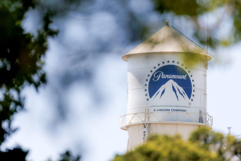 David Ellison continues to put his stamp on Paramount after its acquisition by Skydance.
The CEO and chairman told employees Thursday that they will be expected to work in the office five days a week starting Jan. 5, 2026, according to a memo obtained by CNBC. Employees who do not wish to make the transition can seek a buyout starting Thursday and until Sept. 15.
“To achieve what we’ve set out to do — and to truly unlock Paramount’s full potential — we must make meaningful changes that position us for long-term success,” Ellison wrote to staffers. “These changes are about building a stronger, more connected, and agile organization that can deliver on our goals and compete at the highest level. We have a lot to accomplish and we’re moving fast. We need to all be rowing in the same direction. And especially when you’re dealing with a creative business like ours, that begins with being together in person.”
The move could help Paramount thin the herd ahead of looming staffing cuts.
Variety reported last month that the company is expected to lay off between 2,000 and 3,000 employees as part of its postmerger cost-cutting measures. These cuts are slated for early November, Variety reported.
Paramount is looking to take $2 billion in costs out of the conglomerate amid advertising losses and industrywide struggles with traditional cable networks.
Phase one of Ellison’s back-to-work plan will see employees in Los Angeles and New York returning to a full five-day workweek in the new year.
Phase two will focus on offices outside LA and New York, including international locations. A similar buyout program will be offered in 2026 for those who operate in these locations.
“We recognize this represents a significant change for many, and we’re committed to supporting you throughout this transition,” Ellison wrote. “We will work closely with managers to ensure you have the time and flexibility to make the necessary adjustments.”
This post appeared first on NBC NEWS Paramount mandates 5-day-a-week return to office ahead of major cost cuts